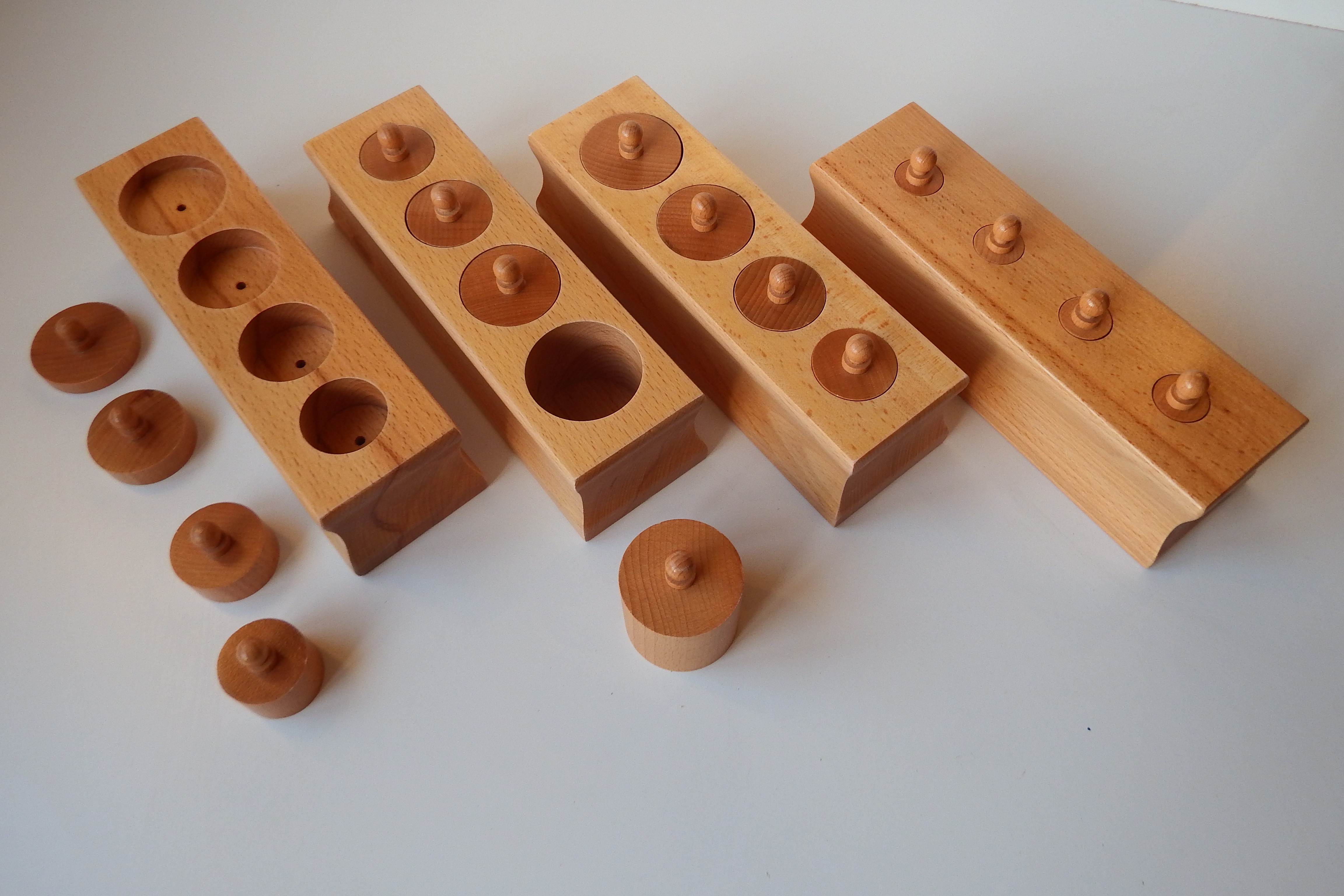 knobbled Cylinder Blocks with 4 holes Beechwood Montessori PreSchool